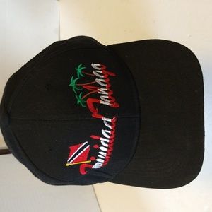 NWOT. Trinidad Tobago baseball cap in Black with embroidered logo.
